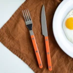 fourchette de table bistrot orange de Sabre